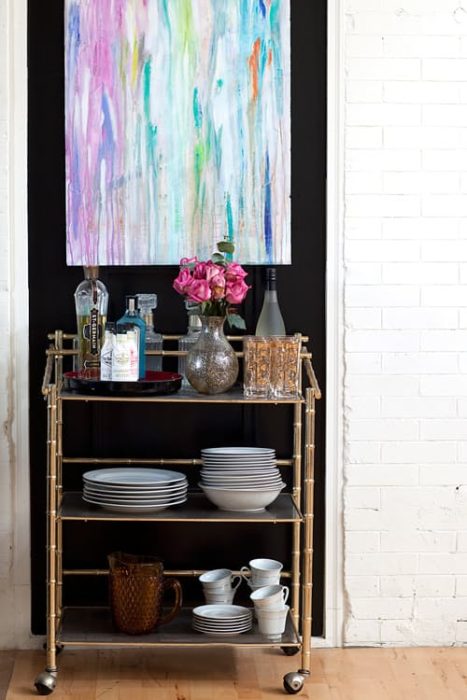 make-a-small-kitchen-storage-area-stand-out-with-dark-paint